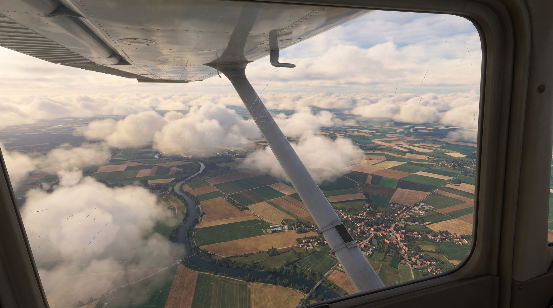 A town and river seen from a plane