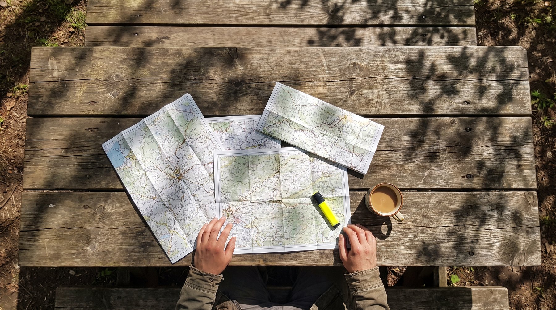 Choosing among several maps on a table